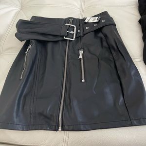 Size 0 faux leather skirt! Never worn with tags